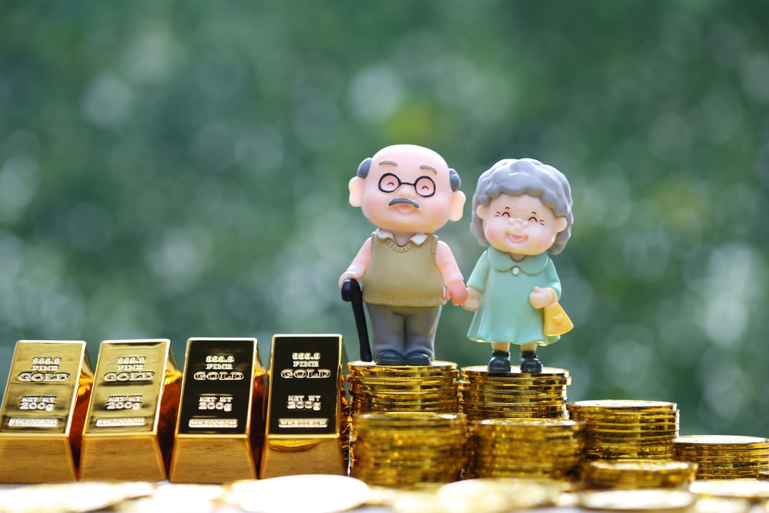 Mutual fund,Love couple senior with gold coin money and gold bar