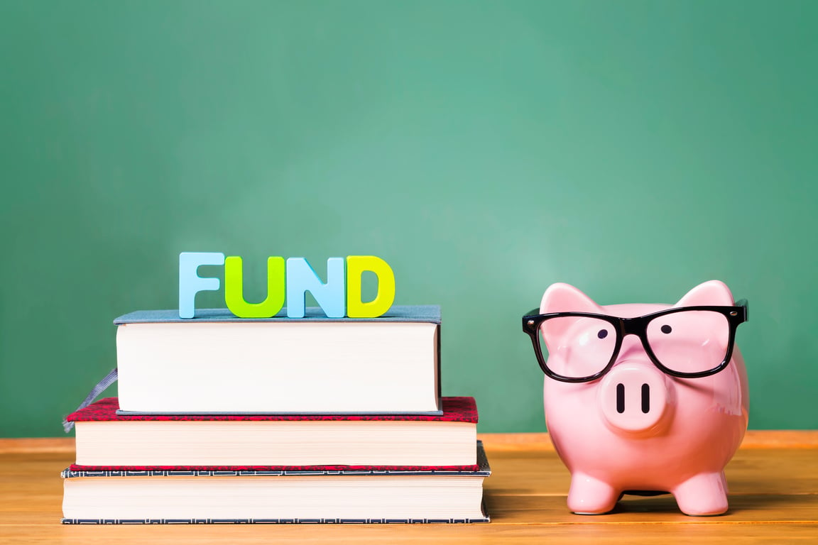 Education funding theme with pink piggy bank