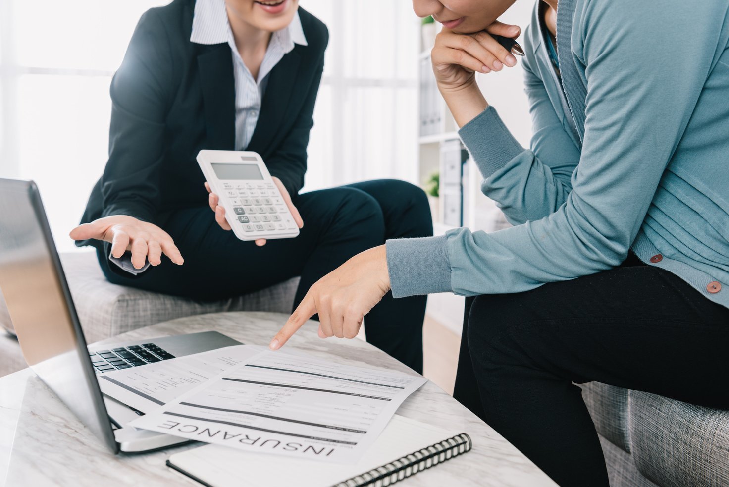 insurance agent showing the amount of the product