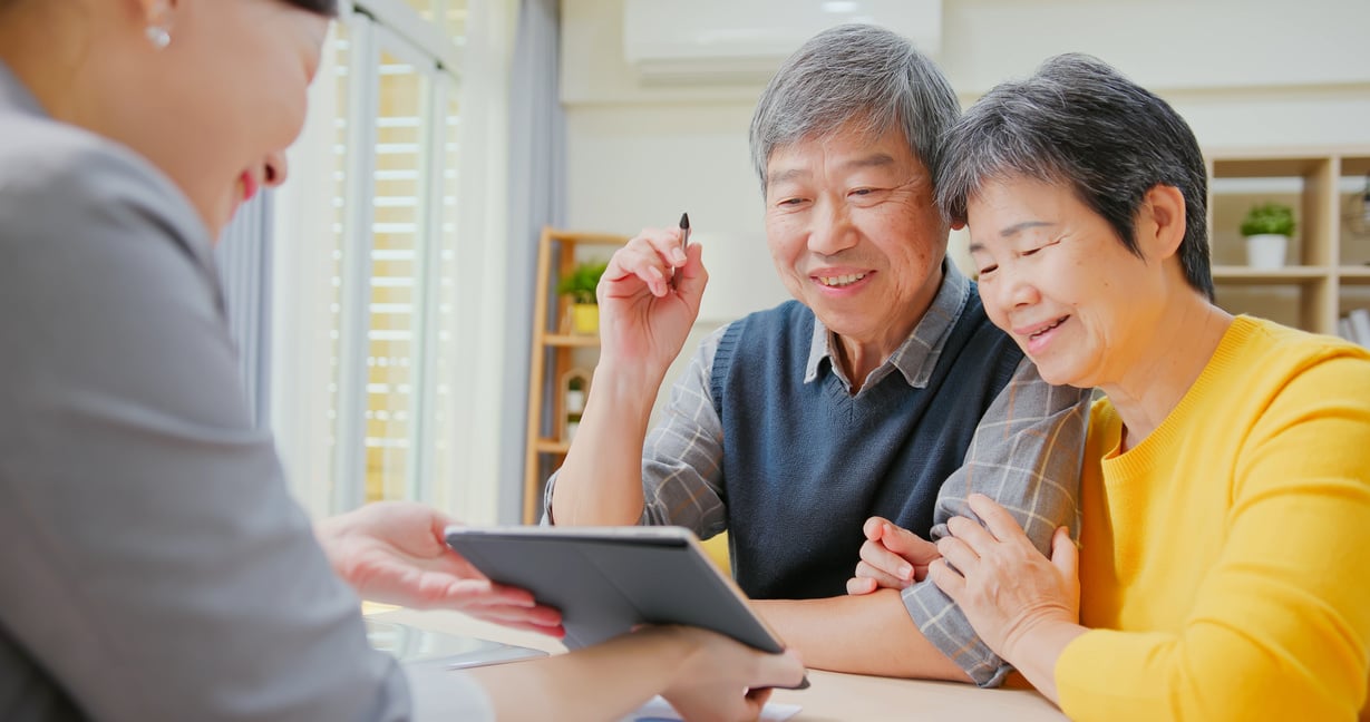 Asian Elderly Couple Buy House